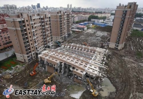 上海倒楼小区九成业主选定赔付方案 多数不退房