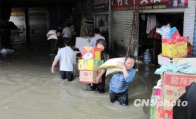 中国南方11省区1500多万人遭受水灾 101人死亡