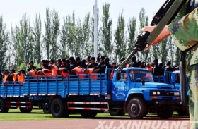 新疆伊犁举行公判公捕大会 55名被告被宣判